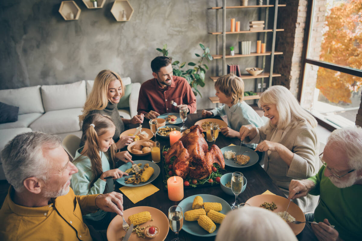 gobbler with a family eating Thanksgiving dinner