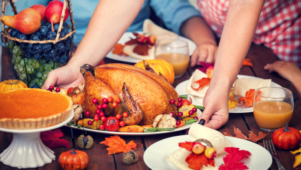 Thanksgiving host gifts turkey dinner on the table