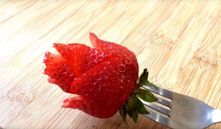 strawberry rose on fork