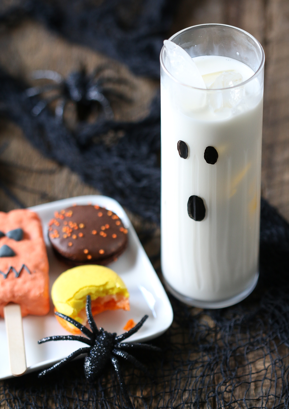 Halloween highball cocktail, macarons and brownie pop