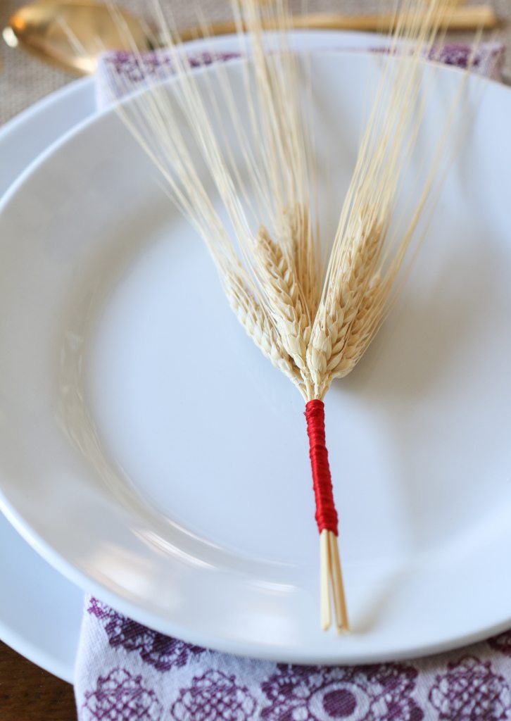 DIY wrapped wheat bouquet for Thanksgiving table.