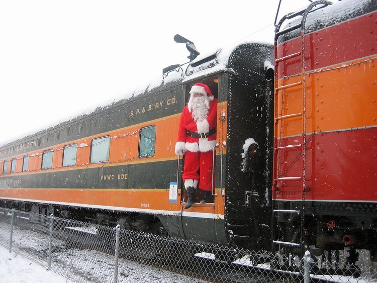 Santa boards a train