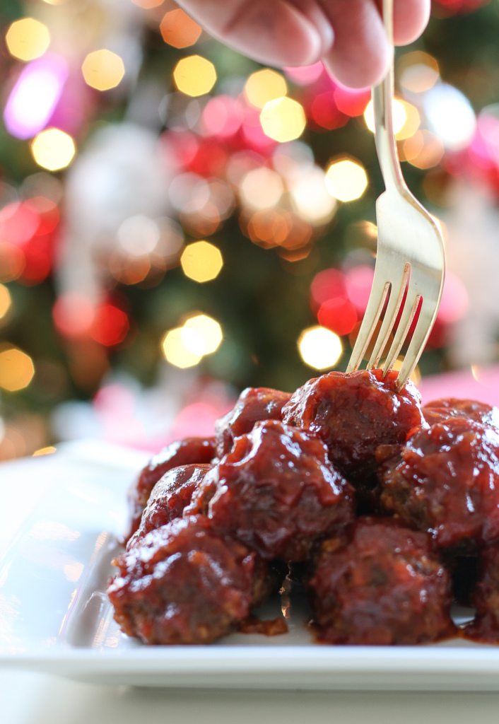 sticking a fork in meatballs