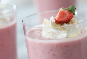 strawberry shortcake smoothies close up with whipped cream thumb e1453316966802
