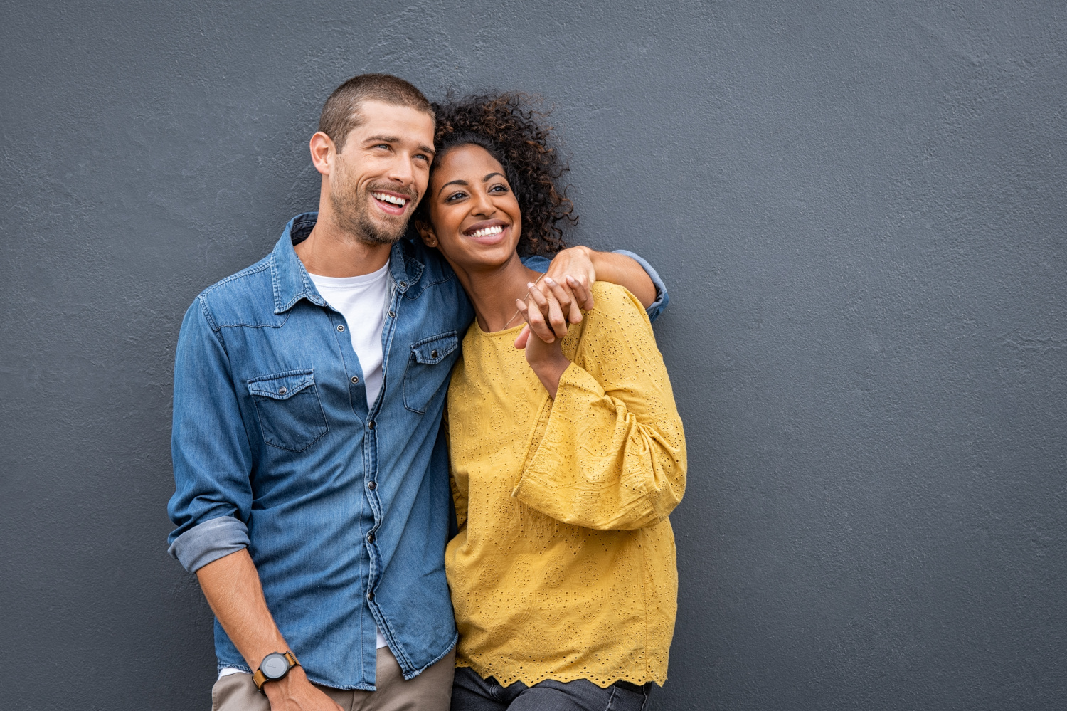 woman with arm around man